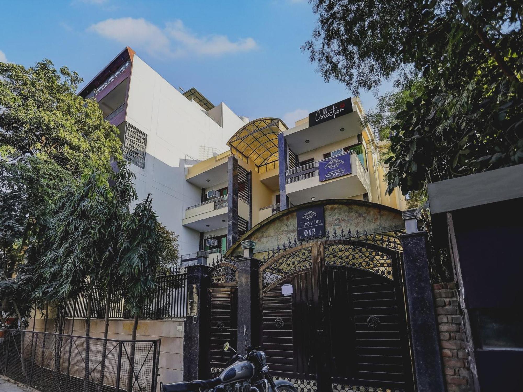 Capital O Uk House Residency Hotel Gurgaon Exterior photo